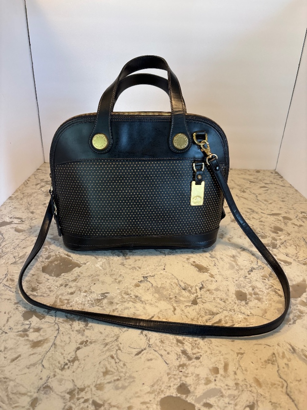 Dooney & Bourke Black Perforated Leather Cabriolet Dome  Satchel Handbag